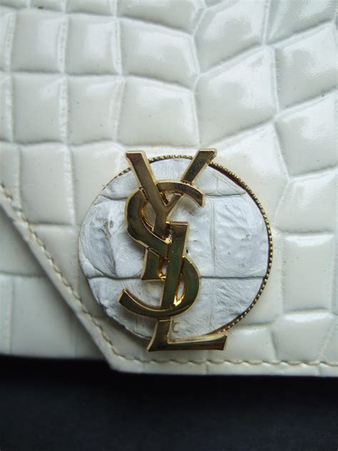 yves saint laurent cream clutch